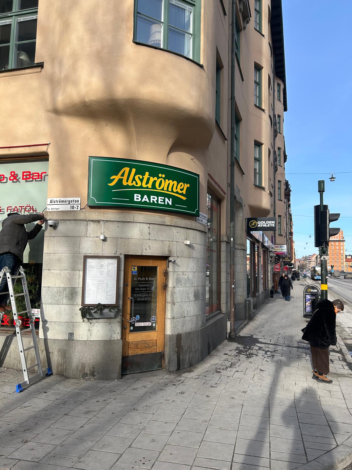 Belyst lightbox-skylt för Alströmer Baren